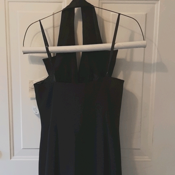 Stunning Plunging Backless Black Halter Gown - Picture 7 of 16